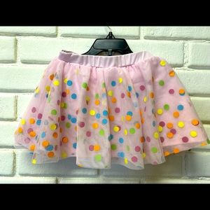Adorable Disney brand, polka dot, tule skirt. Fits 3T - 4T.
